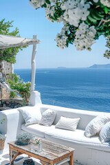 An idyllic seating area showcases breathtaking ocean views surrounded by vibrant flowers and cozy ambiance.