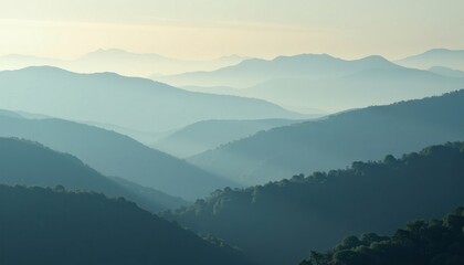 Obraz premium Breathtaking Mountain Ran View in Soft Blue and White with Muted Trees and Visible Sky