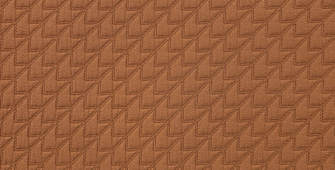 Seamless pattern of brown fabric textile. Upholstery brown cloth texture with herringbone stiching. Emboss chevron canvas background. Decorative fabric for curtain, furniture, walls, clothes.