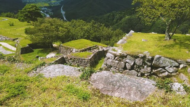 Viewpoint of Japanese ancient Takeda castle landscape, natural greenery at mountains of Asago City in Hyogo