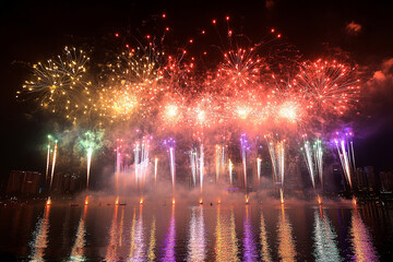 Happy New Year 2025. Beautiful New year Wallpaper, Poster. Creative holiday web banner or Greeting card with red fireworks and sparkling text 2025 on night sky background. AI