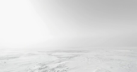 Fototapeta premium A vast, snowy landscape under a bright, overcast sky.