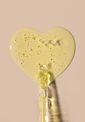 serum tests glass pipettes with drops of serum on a light beige background
