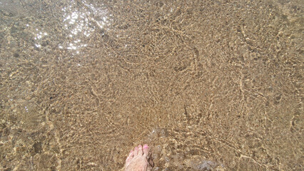 Much stones in the sea, river, lake, ocean water. Nature background.