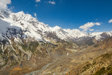 View of Annapurna I, Gangapurna, Tilicho mountains, lake and Marsyangdi river in Himalayas, Annapurna Conservation Area, Nepal. Snow capped landscape. Annapurna Circuit Trek. Hiking trekking concept.