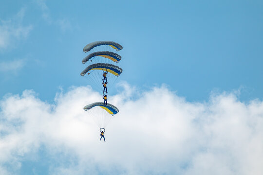 Epic ukrainian parachutists formation on airshow above clouds