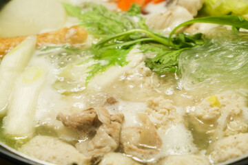 Hot pot with chicken meatballs and vegetables as ingredients, often eaten in winter in Japan