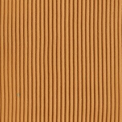 This corduroy fabric features a warm brown color with pronounced vertical ribs, ideal for crafting stylish clothing or home decor