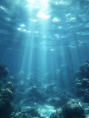 Fototapeta premium Sunbeams illuminate underwater ocean floor.