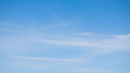 Serene Blue Sky with Wispy Cirrus Clouds - Peaceful Nature Background