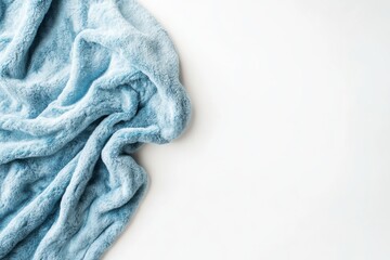 Soft blue fleece blanket arranged on a clean white background, showcasing stylish home textiles with exquisite texture and detail
