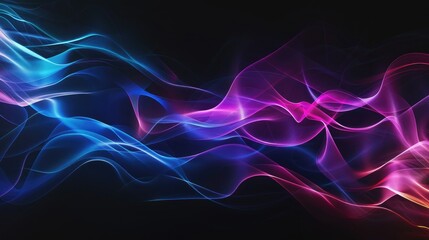 Obraz premium Abstract waves of colorful light flowing against a dark background, creating a dynamic visual effect.