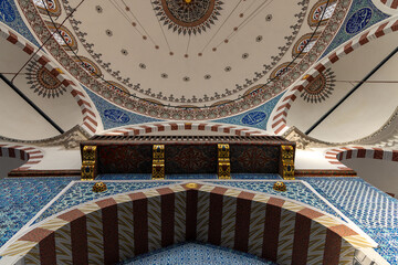 Obraz premium Ornate mosque dome and calligraphic ceiling decoration, Islamic architecture in Turkey