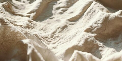 Naklejka premium A white blanket with a sandy texture