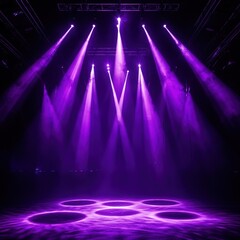 bright purple stage lights illuminate an empty stage with light beams and fog