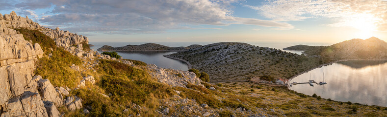  Kornati island archipelago at sunrise. Kornati National Park panorama, Croatia