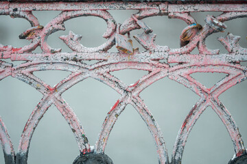 A fragment of an old bridge against the backdrop of a river with lovers' castles.
