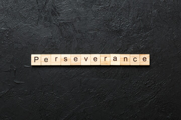 perseverance word written on wood block. perseverance text on table, concept