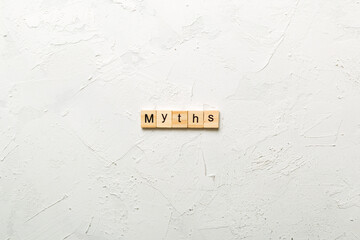 myths word written on wood block. myths text on table, concept