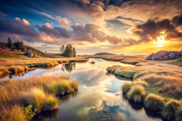 Obraz premium Breathtaking landscape with serene river, lush grass, and vibrant sunset