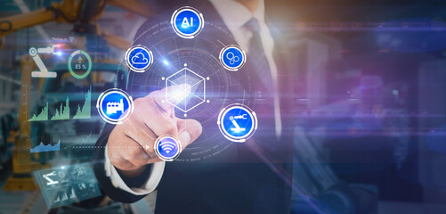 Automation Smart industry control concept.Hands holding tablet on blurred automation machine as background