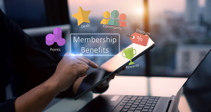 Membership benefits customer relation concept,man hands using digital tablet on blurred city as background
