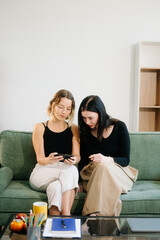 Explore vibrant teamwork, creativity, and learning with young adults using laptops and headphones...