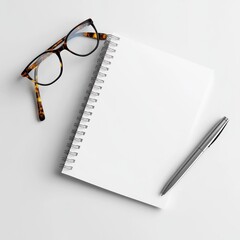 Fototapeta premium Blank notepad, pen, glasses; white background; planning concept