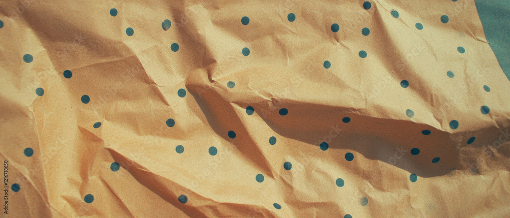 Poster kraft paper texture featuring a uniform dotted pattern with small dots across the surface