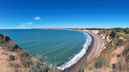 Coastal Landscape: Serene Beach, Cliffs, and Azure Ocean under a Sunny Sky
