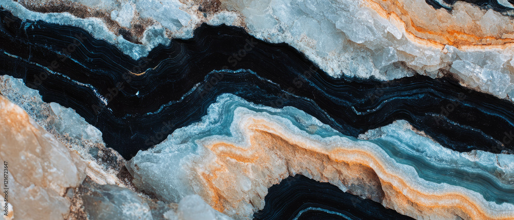 Poster quartz veins and linear formations create striking textures in contrasting rock layers