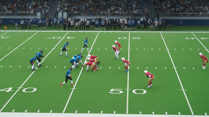 Two American Football Teams Stand Across From Each Other on the Line of Scrimmage as the Ball is...
