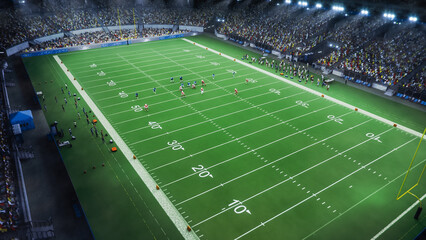 Aerial Photo of Two Diverse Athletic Teams Fight for Positions at the Start of the Tournament Game in a Crowded Stadium with Sport Fans. Ball is Snapped and Players Fight for the Pigskin Ball