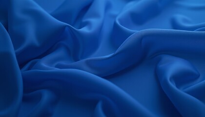 Fototapeta premium Deep blue chiffon fabric with soft flowing folds.