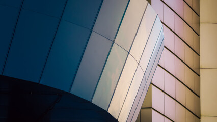 fragment of the wall of a modern blue building on a white background