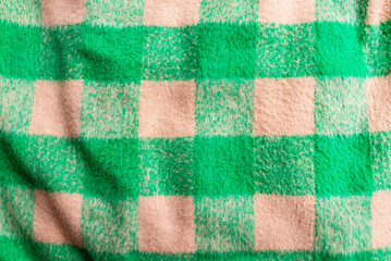 Checkered green gray fabric texture cloth background.