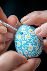 Hands delicately painting intricate floral designs on a beautifully colored Easter egg in vibrant detail. Generative AI