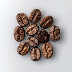 Fototapeta premium Small pile of premium coffee beans on a white background.