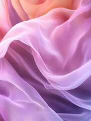 Fototapeta premium Pink and purple silk fabric with flowing folds against a gray backdrop.