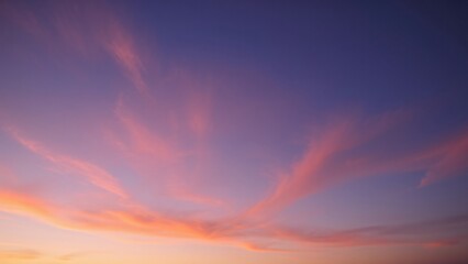 Serene Sunset Sky Pastel Hues and Wispy Clouds