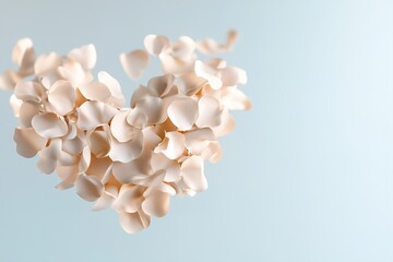 A stunning display of golden rose petals gracefully descends, creating a heart shape in midair, illuminated softly against a muted pastel gradient, allowing for ample clean space for text