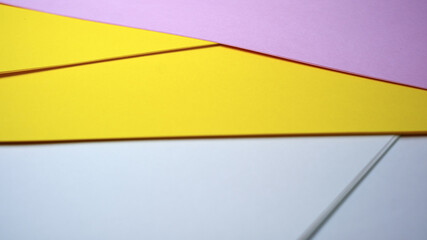 Vibrant colors and textures collide in layered paper composition