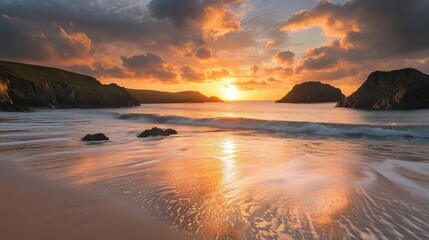 Fiery sunset over a tranquil beach with golden hues reflected in the calm ocean waves