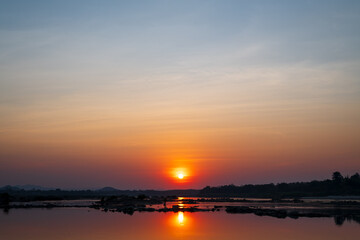 Panoramic beautiful sunset sky, Cloud in twilight -  nature background. View of sunset over the Mekong River at Thailand.