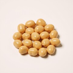 Isolated chickpeas showcase an asymmetrically-shaped pure and protein-rich array against a white background