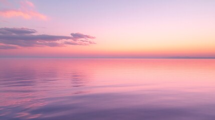 Obraz premium A Tranquil Ocean Horizon Bathed in Gentle Pastel Colors at Sunset with a Serene Sky