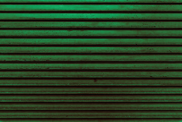 Old dark green steel door for steel metal backgroud and texture.