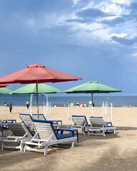 beach chairs and umbrella