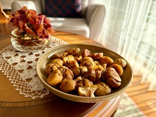 Roasted grilled chestnuts in plate ready to eat
