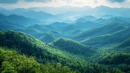 Obraz premium A sweeping vista of rolling mountains with forests in the valleys below, lush scenery, mountain range background